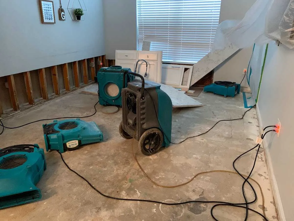 Dehumidifier in flood-cut room for Water Damage Restoration in Port Orchard